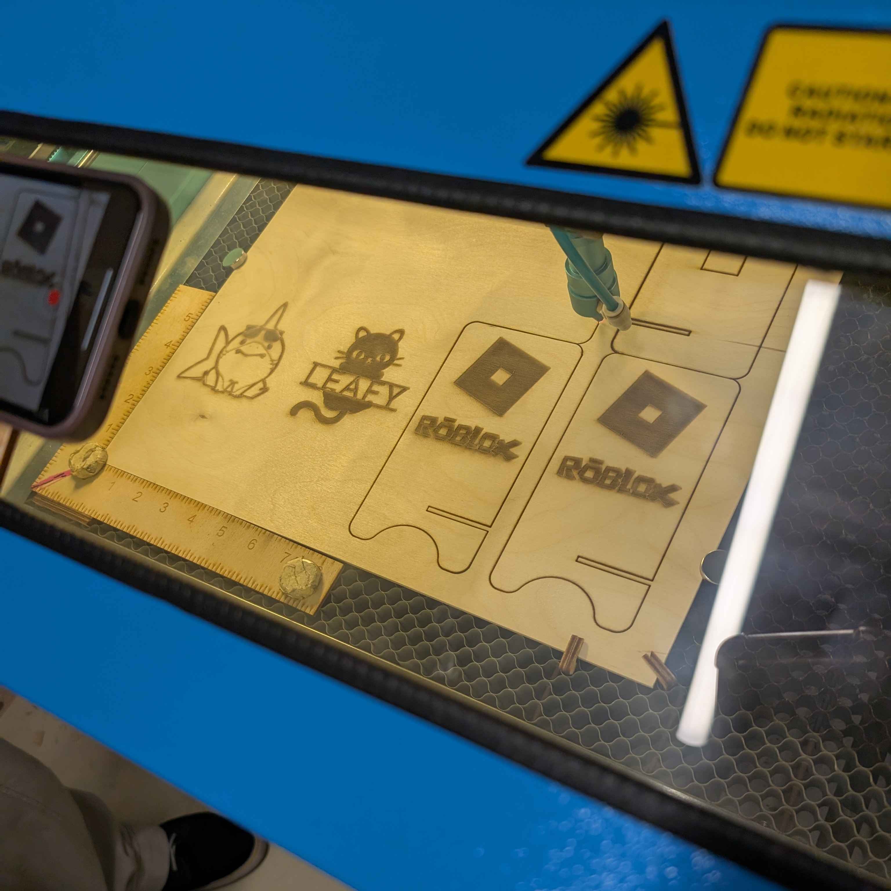 Before my stand started cutting, I hung around rhe laser cutting room to watch it print the group before me. I was surprised to see how fast the machine itself works. it's actually quite mesmerizing and they inspired me to record a time lapse of the process when it became my turn.