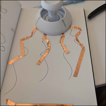 I tried to implement the joystick I had 3D printed earlier to act as part of the circut or the copper tape design I was creating.