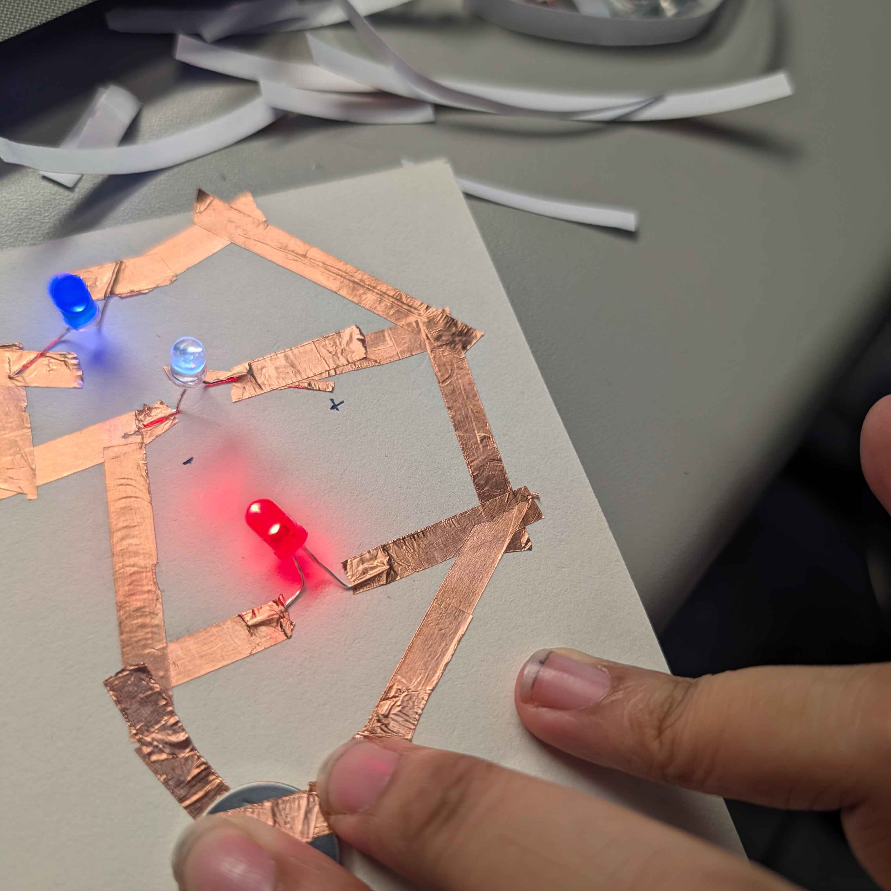 A three way parralel circut that I playing around with a lot during class that finally worked after a lot of tests, errors and tape.