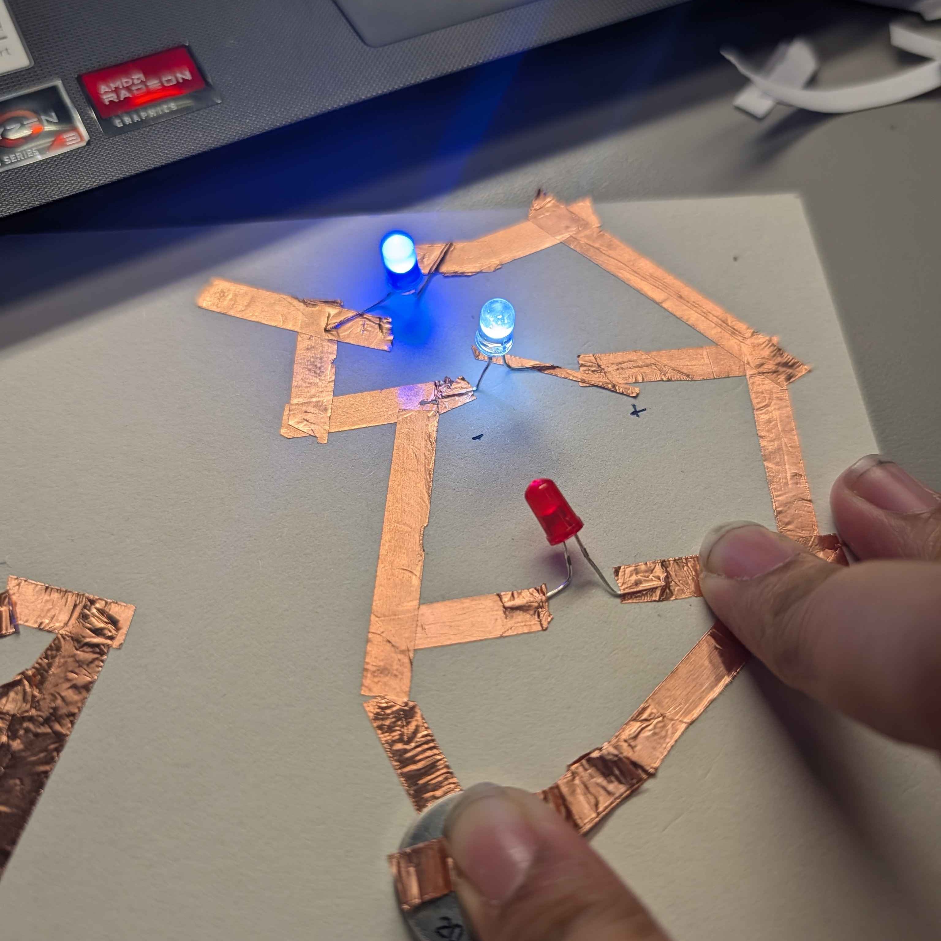 I flipped the battery coin and the other lights turned on much to my surprise. I was amazed and also incredibly annoyed because I was under the belief that all my errors were due to the copper tape connection not being strong enough for electricity to travel through it.