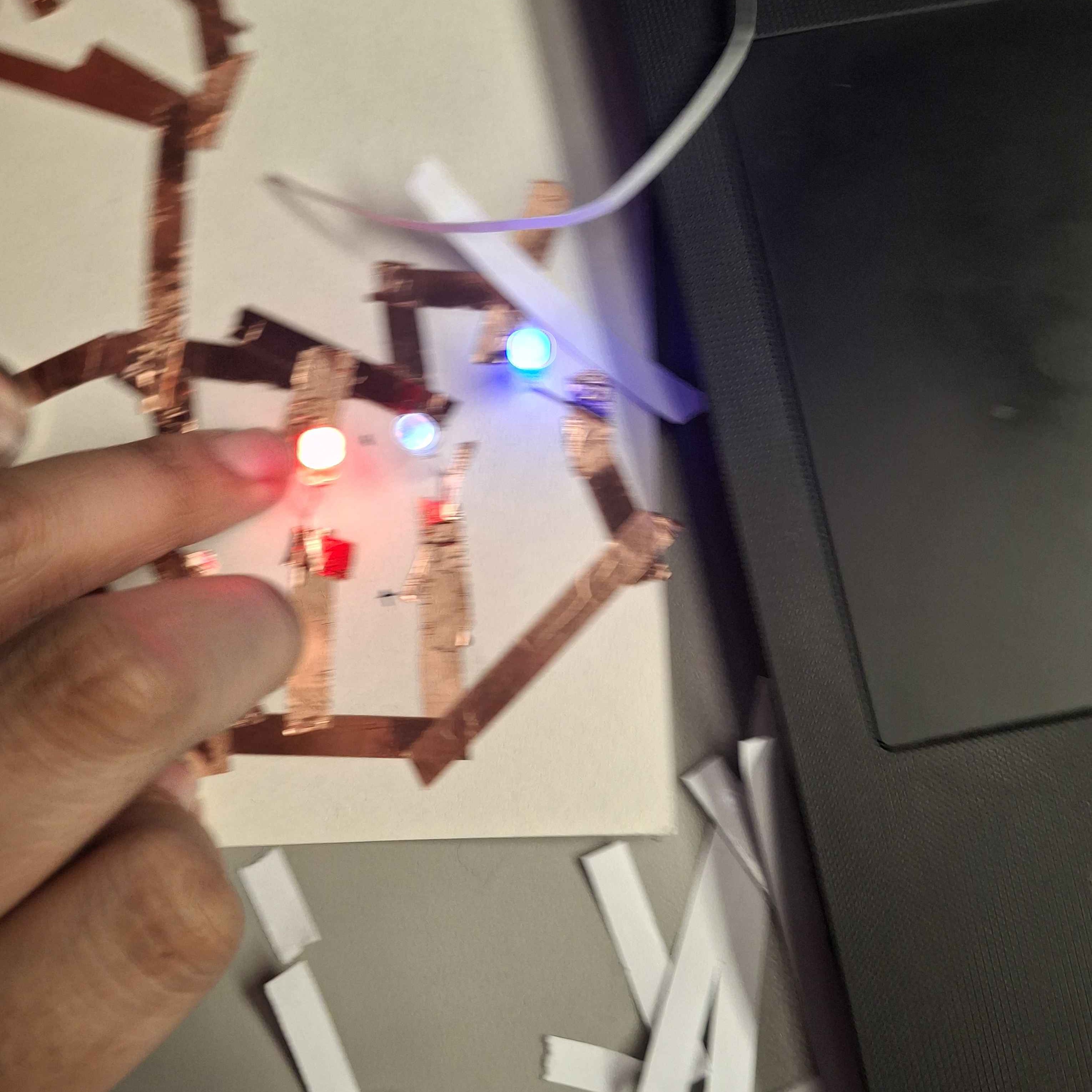 My friend took a shaky picture because at this point in the in-class assignment, I was getting mildly frusturated with how this wasn't working. I was following the example image, even if my own circut was more messy and disorganized than the example. I was so happy and excited for this result, I began to laugh and told my friend to take a picture before it malfunctioned or stopped working.