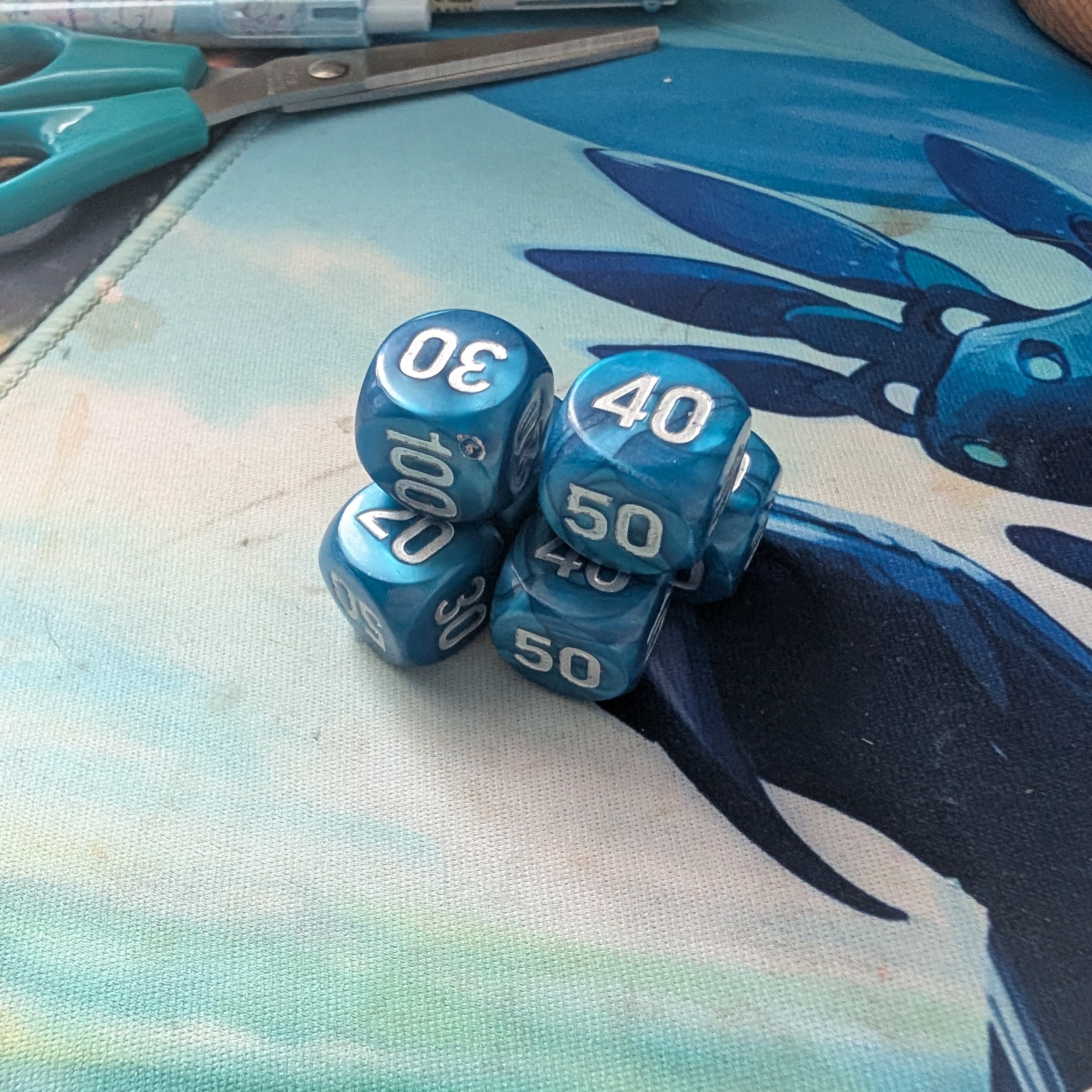 I got this dice set when I got back into collecting pokemon cards, I used to play games that involved using dice like monopoly and just to help decide if I'm having difficulty. There's something about dice rolling that I find so satisfying, whether its the cool die rolling around in my hand, clicking against each other and then winning a bet after seeing the result. Whether that means I'm in love with gambling or the concept of destiny and fated outcomes, I like playing with dice. It also makes a very satisfying sound.<br><audio controls src='Noises/Dice roll.m4a'></audio>